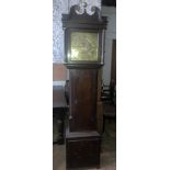 A Thomas Lister of Halifax brass faced oak cased grandfather clock with swan neck top and brass