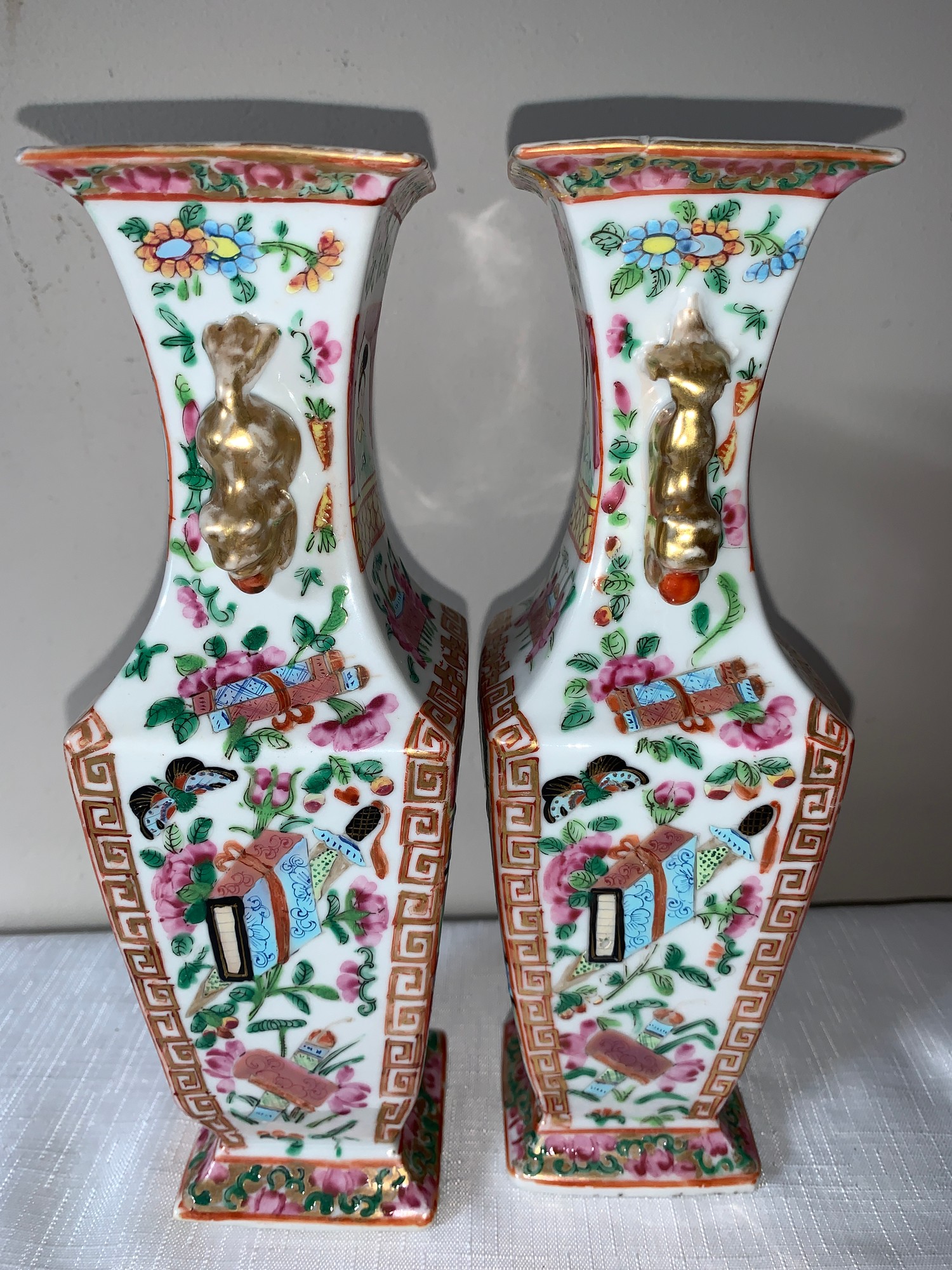 A garniture of four 19thC Chinese famille rose Mandarin pattern tallest 23cms h.Condition - Image 6 of 10
