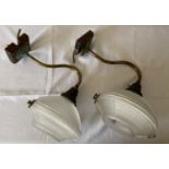 A pair of vintage holophane glass wall lights with brass arms. Approx. 12cms high x 18.5cms w.