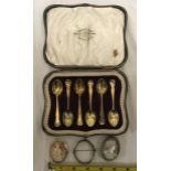 A cased set of six silver gilded 9cms coffee spoons by Reid and Sons London 1919 - 41gms together