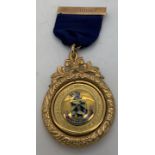 A 9ct gold medal on 9ct gold 'President' badge for Huddersfield & District licensed Victuallers