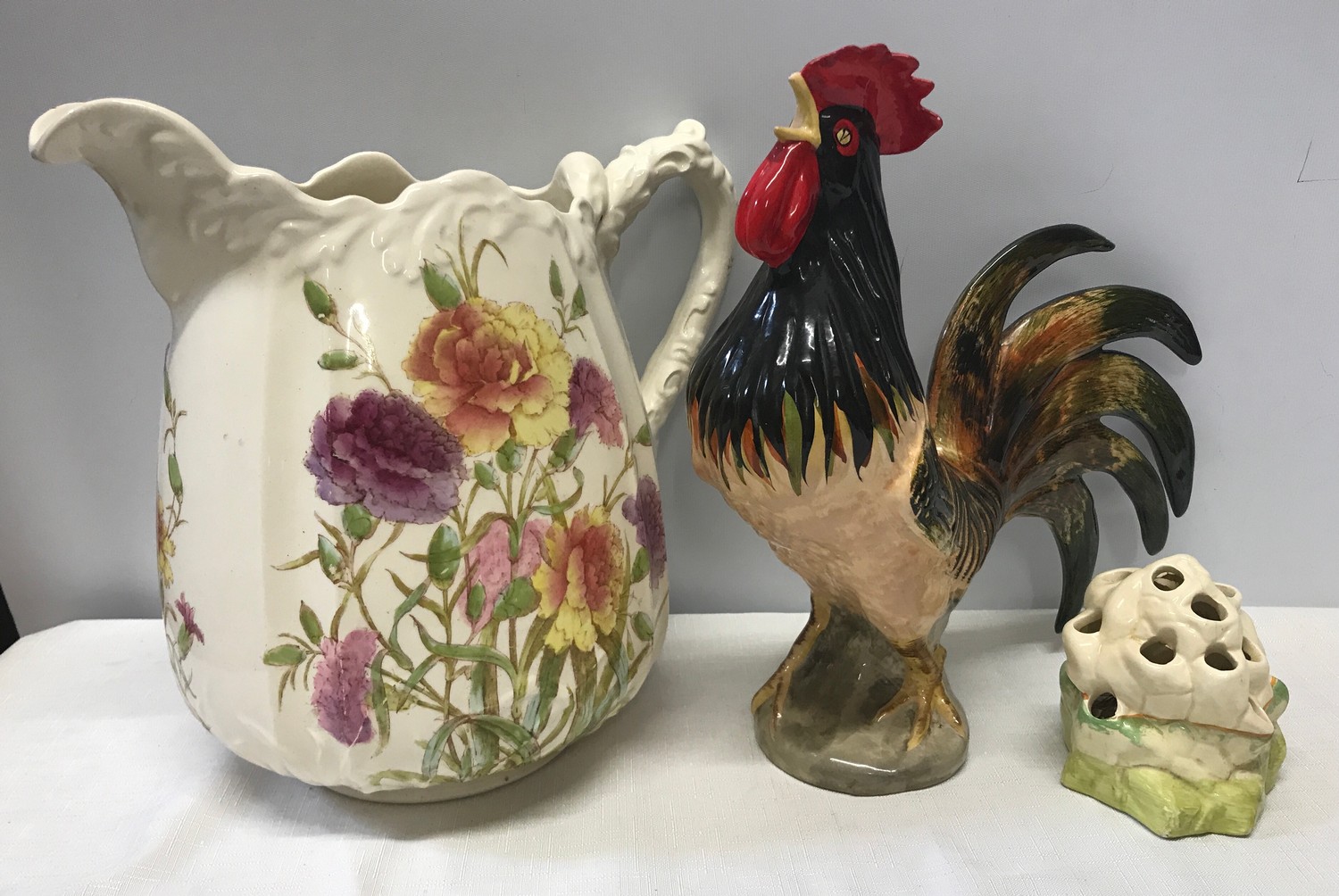 Mixed lot of Clarice Cliff Bizarre posy vase 10.5cm h. Babbacombe pottery cockerel 30cm h and a