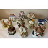 Ten Staffordshire cottages to include money boxes and pastille burners, some 19thC.Condition