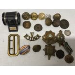 A selection of WWI and WWII military and naval buttons and cap badges to include Royal Army