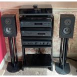 A NAD sound system with Linn speakers mounted on Atacama stands. To include a CD player model C520
