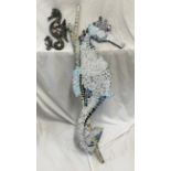 A large wall mounted mosaic seahorse 117cms h together with two small Shellart seahorse figures