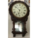 A 19thC carved mahogany wall clock with visible pendulum. Rexton & Heap Beverley. 73 h x 42 w.