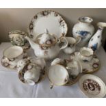 A Royal Albert "Celebration" pattern part tea service to include 6 cups, saucers and plates, a