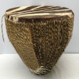 A large African zebra skin drum approx. 50cms w x 48cms h.Condition ReportSome fur wear patches to