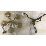 Two brass ceiling light fittings, one with 3 branches and white glass shades approx 52cms w x