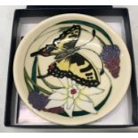 Moorcroft Butterfly and Narcissus flower design pin tray 12cm d, circa 2009 with box.Condition