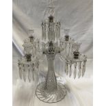 A large glass five branch candelabra, 59cm h x 47cm w, base width 22cm.Condition ReportOne branch