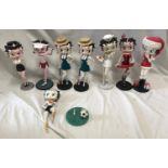 Collection of 8 Betty Boop figures of a Policewoman, Christmas, Can-can dancer, Nurse, 2 x Hockey,