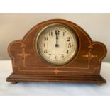 An Edwardian inlaid mantle clock. 16.5cms x 25cms.Condition ReportNot in working order.