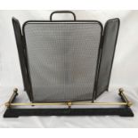 A small cast iron and brass fender and a brass framed three fold mesh fire screen. Fender 84cm w x