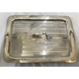 A hallmarked silver topped glass dressing table tray J .G. Ltd Birmingham 1921. 418gms. 30cms w x