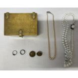 A small collection of costume jewellery to include a brass box on feet decorated with birds and