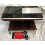 A Bang and Olufsen Beocenter 7007 record deck, cassette and tuner on a Bang and Olufsen rosewood and