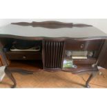 A PYE Series Double 2 record player and radiogram in a cabinet. 110cms w x 7.5cmsh x 42cms d.