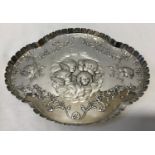 A hallmarked silver oval tray with embossed cherub design. B.P.D.C. Birmingham 274g. Date indistinct