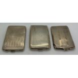 Three hallmarked silver match book covers with engine turned decoration. Birmingham 1925 x 2 and