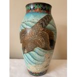 A Cloisonne vase depicting bird in flight. 31cms h.Condition ReportHole in the enamel and loss to