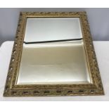 Decorative gilt framed bevel edge wall mirror frame size 49.5cms w x 60.5cms h.Condition