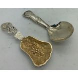 Two silver caddy spoons, one Birmingham 1972 by Israel Freeman & Son Ltd and Birmingham 1825 by