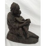 A bronze effect resin figurine of Mother and Child reading book. Initialled signed and numbered