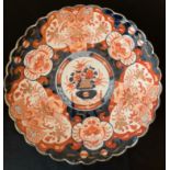 A 19th Imari pattern plate, 30cms d.Condition ReportVery slight rub to gilt in places.