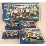 A Lego City Police Truck 7743, Helicopter 7741, Van 7286 and 2 Police cars with speed camera 7236.