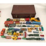 A collection of fifty assorted Dinky, Corgi and Lesney diecast vehicles together with a small