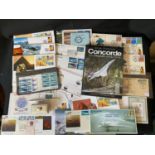 A box containing Concorde souvenirs including Concorde pen and ink blotter, signed and un signed