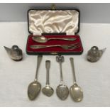 A selection of silverware to include teaspoons, one Georgian, one Pand O enamelled, one condiment