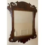 A 19thC mahogany and gilt fretted wall mirror. 67 h x 48cms w.Condition ReportSlight cracks to