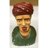 A painted Gaper figurehead for chemist shop display. 26cms h x 17cms w.Condition ReportPaint chips