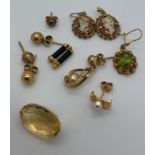 Various earrings including a pair of 9ct gold cameos, studs, odd earrings, some marked 9ct and a