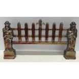 Lustre metal fire front with knight supports 48cms l x 26cms h x 7 cms d.Condition ReportGood