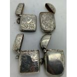Four various silver vesta cases including one hall marked Chester 1912 with inscription Spurn Head