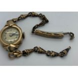 A Rolex Standard 17 jewel case lady's gold coloured wristwatch.Condition ReportSome wear to plate