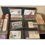 A box of First Day covers, presentation packs etc.