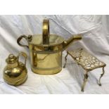 A selection of brassware to include a large watering can 41cms h to handle, a trivet stand 18cms h