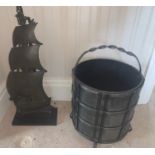 A cast iron sailing ship fire tidy 60cms h x 27cms w with iron coal bucket.Condition ReportOne