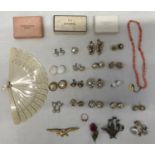 A collection of costume jewellery to include 16 x clip-on earrings of pearl, diamanté design, a pink