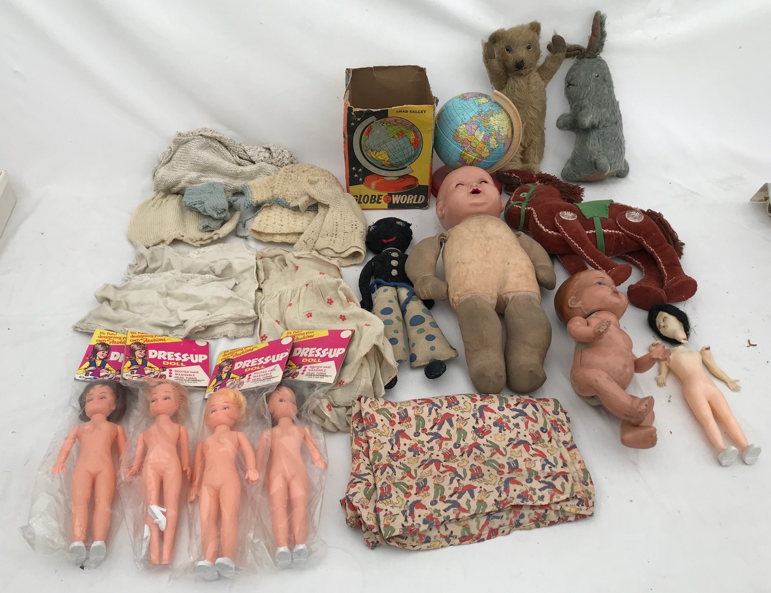 A selection of plastic and soft toys including Chad Valley tin globe, plush fur teddy 25cms, Rabbit,