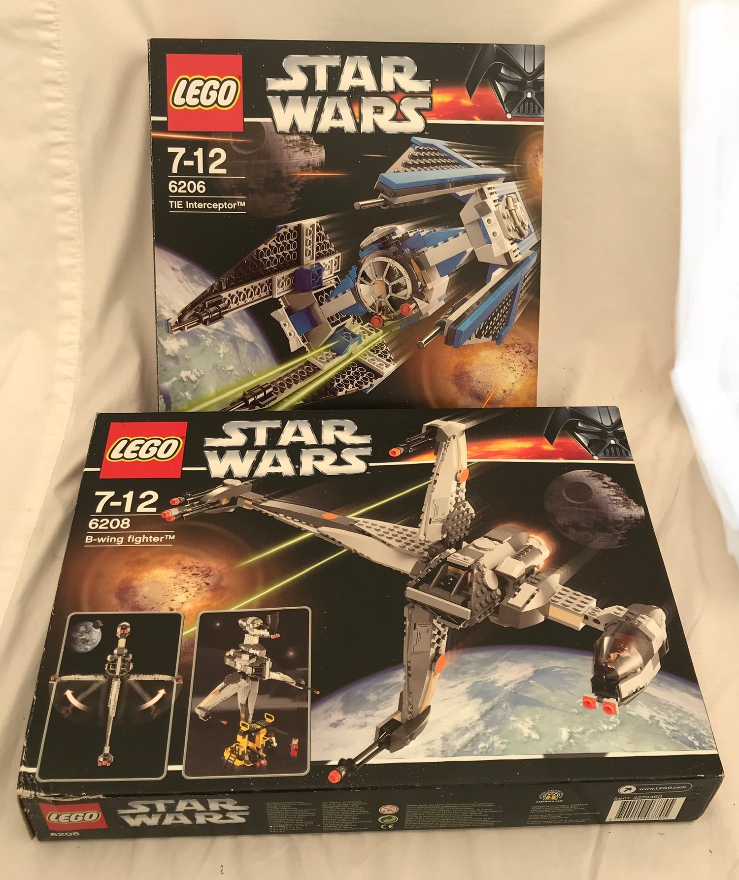 A collection of Lego Star Wars. Set number 6206 TIE Interceptor and 6208 B-Wing Fighter with boxes.