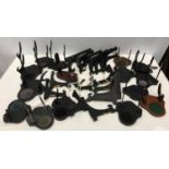 Collection of plate display stands, ebonised wood including cup saucer stands, some wire.Condition