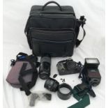 A Minolta 7000 camera kit with bag and accessories including Minolta AF lens 70-210, AF lens 50,