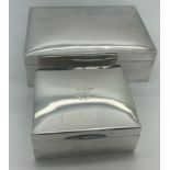 A silver box with slightly domed top and green leather interior with bridge instructions, Asprey and