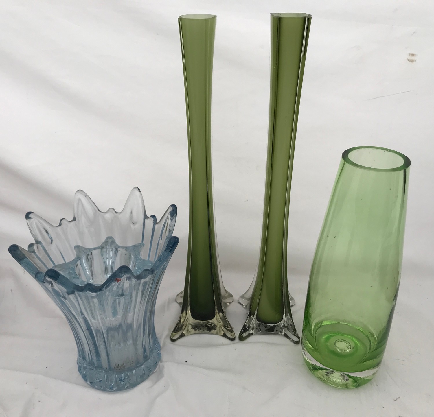 Mid century coloured glass vases to include a pair of green tall slim vases 40cms h, a blue flared